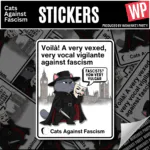 Guy Fawkes Cat Vinyl Sticker – Cats Against Fascism Vigilante cat sticker – grey cat in black hat and cloak holding a Guy Fawkes mask in front of Parliament
